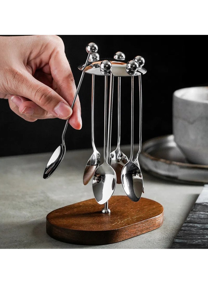 عام مجموعة من ملاعق الفاكهة الصلبة من الفولاذ المقاوم للصدأ على شكل دائري. هذه الملاعق الصغيرة تستخدم في الحلويات والكعكات، كما يمكن استخدامها لتحريك القهوة وكذلك كملاعق شاي لتلبية احتياجات عشاء الشاي. - Image 1