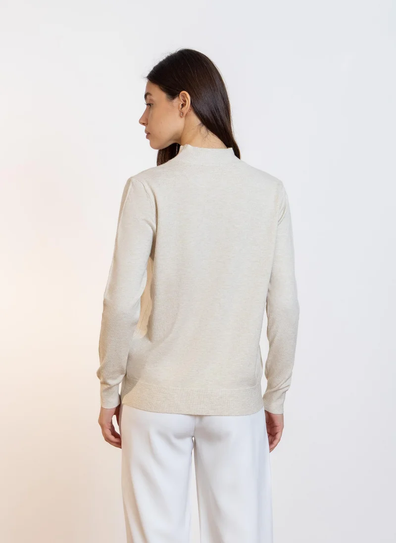 SHAPES HIGH NECK KNITTED TOP