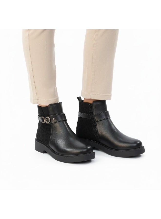Stylish women's boots with a side pattern and elegant design, equipped with a metal strap. - Image 1
