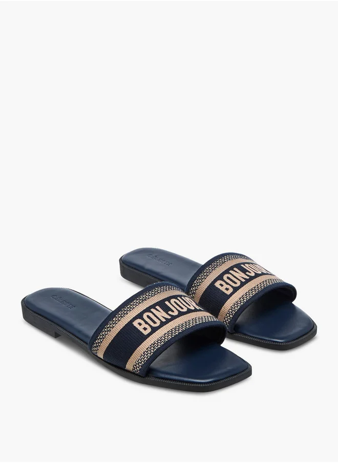 سيليست Women's Textured Slip-On Flat Sandals