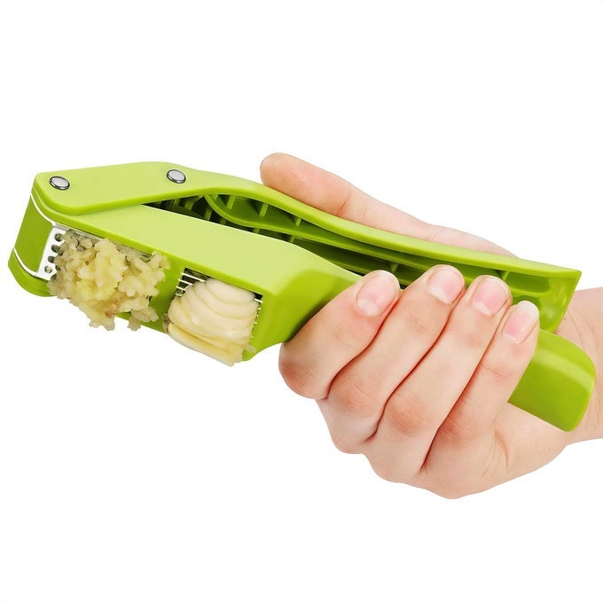 2 IN 1 GARLIC SLICER AND MINCER MULTIPURPOSE GARLIC PRESS AND SLICER STAINLESS STEEL AND DURABLE PLASTIC 76 X 17 X 25 CONVENIENT SIZE EASY TO USE AND CLEAN GOOD FOR HOME COMMERCIAL USE