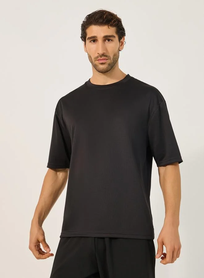 Styli Slogan Print Round Neck Oversized Training T-Shirt