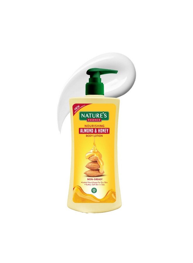 نيتشرز إيسنس لوشن الجسم باللوز والعسل من ناتشرز إسنس، مغذي ومرطب، لوشن غير دهني للبشرة الجافة والخشنة، غني بزبدة الشيا واللوز والعسل، 500 مل - Image 1