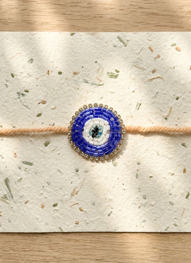 Madhoor Eco-Friendly Plantable Evil Eye Rakhi Blue & White for Brother, 1 Piece - Image 1