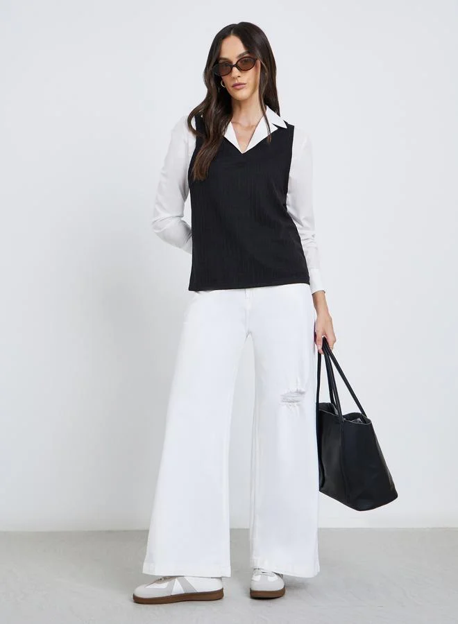 ستايلي بلوزة محبوكة بتفاصيل طبقة مُتباينة