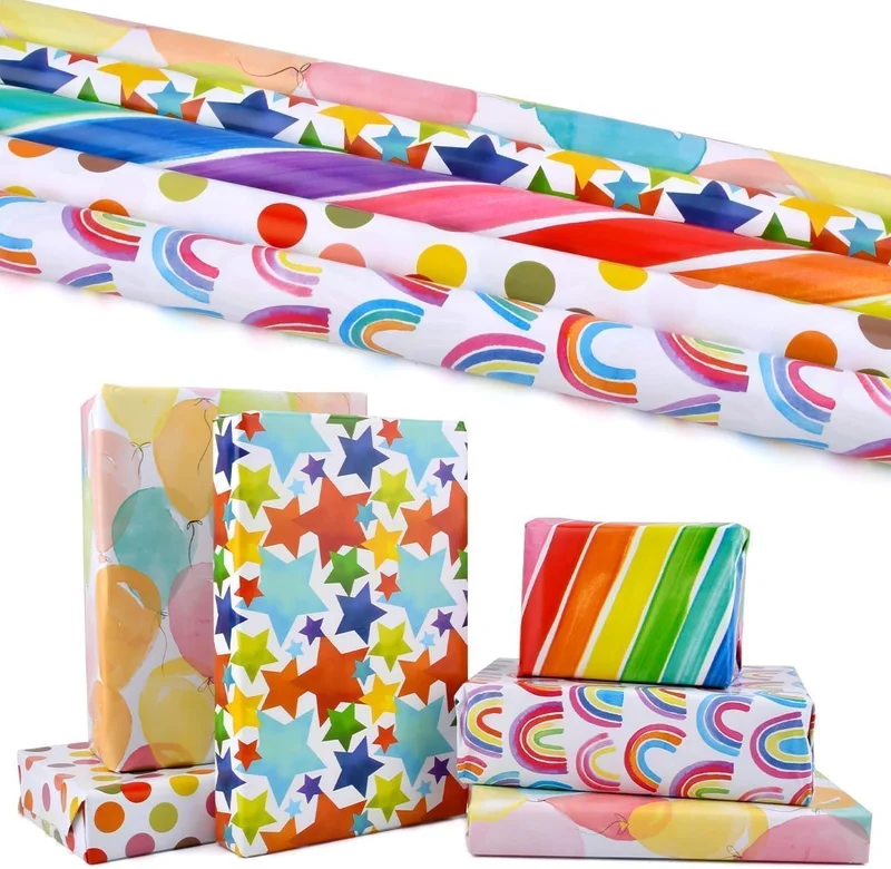 كويزيرا 4-Pack PREMIUM Gift Wrapping Paper Rolls – 12 Meters | 4 Colorful Designs – Rainbows, Stars, Polka Dots & Balloons
