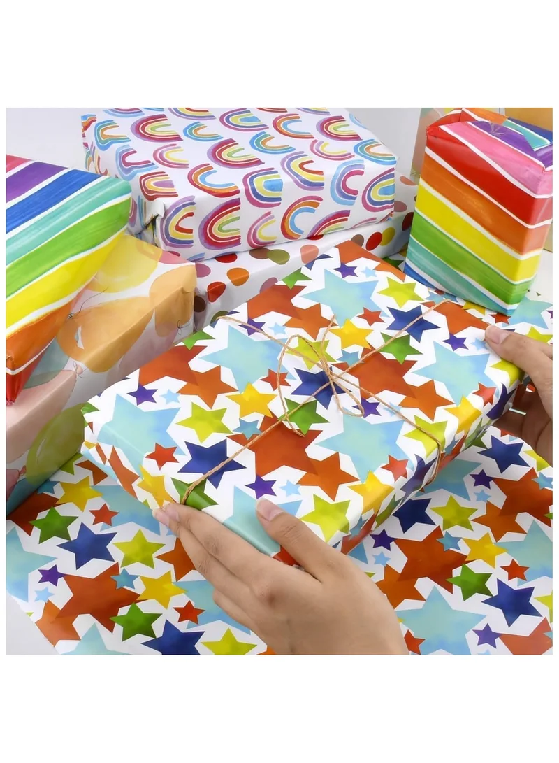 كويزيرا 4-Pack PREMIUM Gift Wrapping Paper Rolls – 12 Meters | 4 Colorful Designs – Rainbows, Stars, Polka Dots & Balloons
