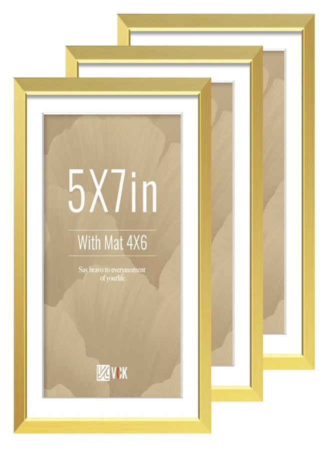 في سي كيه مجموعة إطارات صور VCK ذهبية اللون، مقاس 5x7، ثلاث قطع، إطار معدني فاخر من الألومنيوم مع زجاج مقوى، لعرض صور مقاس 4x6 مع إطار داخلي أو 5x7 بدون إطار، مناسب للمنزل والمكتب والاستوديو والمعرض، للتعليق على الحائط أو وضعه على الطاولة. - Image 1