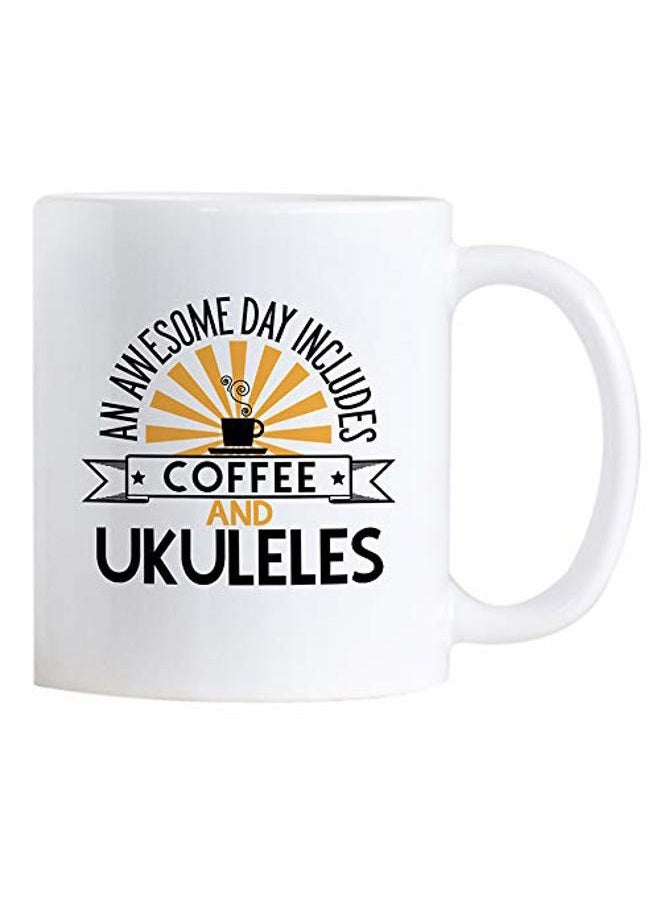 Casitika Ukulele Themed Gifts. 11 oz Ceramic Novelty Mug For Music Player or Teacher. An Awesome Day Includes Coffee and Ukuleles. - Image 1