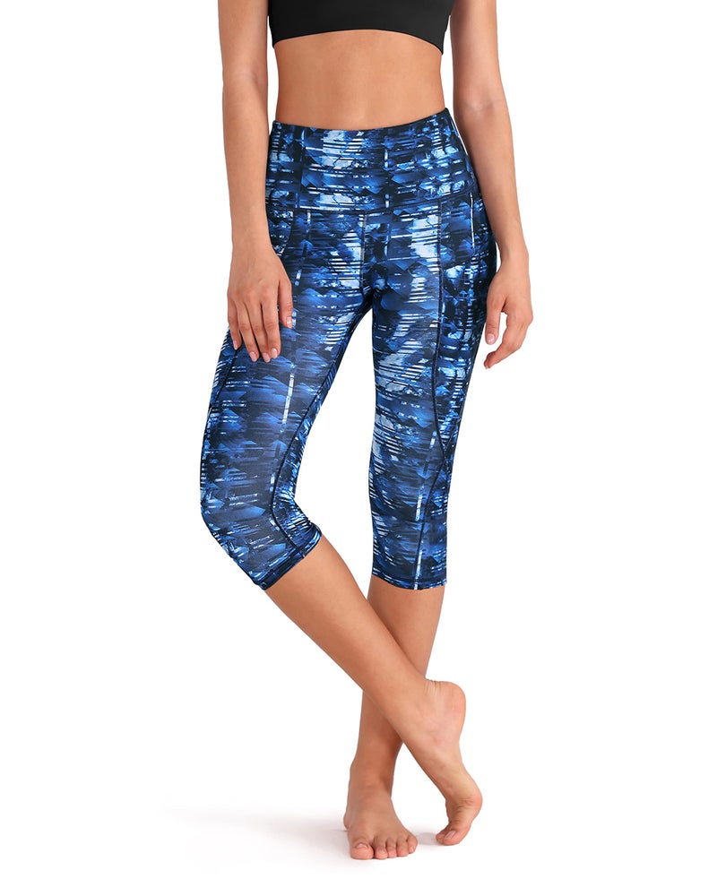 ODODOS Women's High Waisted Pattern Yoga Capri Leggings with Pockets, Tummy Control Non See Through Sports Athletic Workout Running Capris, Indigo, Large - Image 1