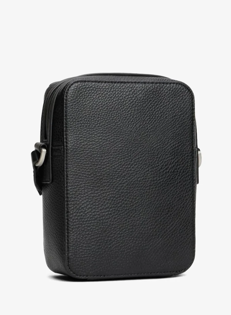 Tommy Hilfiger  Pebble Grain Logo Crossbody Reporter Bag for Men | Best Price UAE