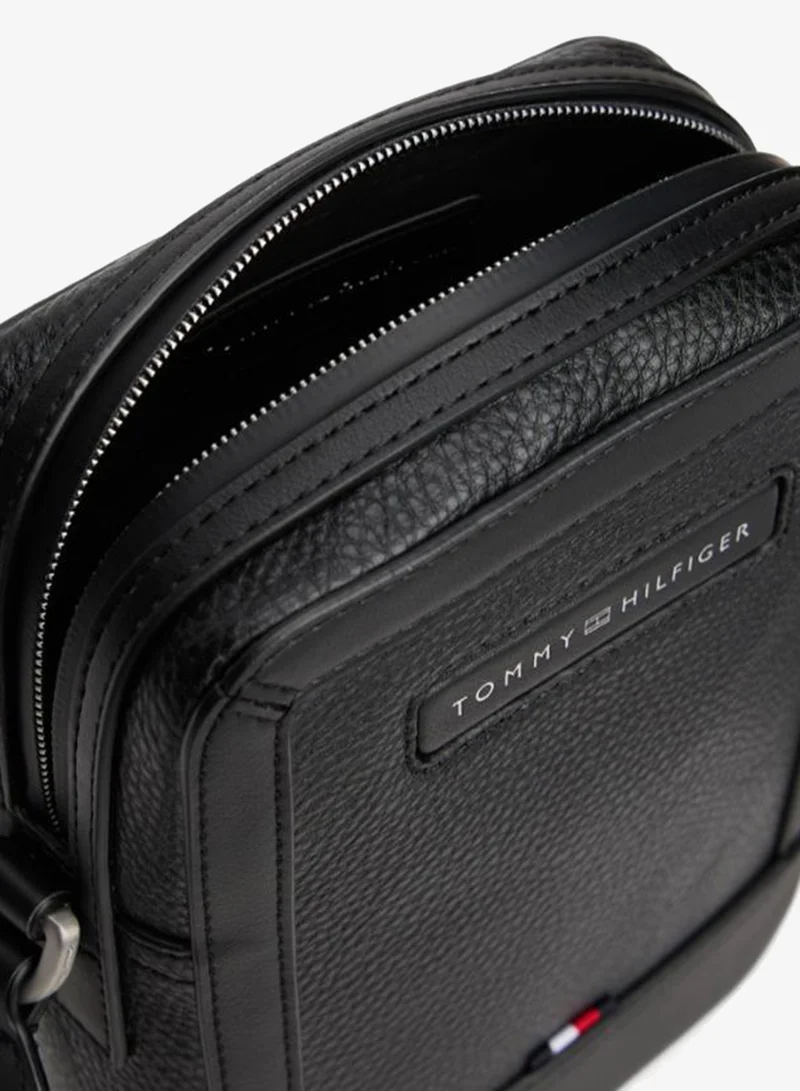 Tommy Hilfiger  Pebble Grain Logo Crossbody Reporter Bag for Men | Best Price UAE