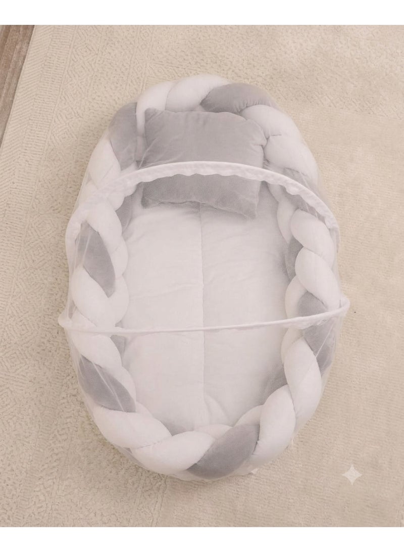 StarKids A portable newborn bed featuring a cozy nest design, a braided protective bumper, and a detachable, built-in mosquito net, ensuring a peaceful, safe, and comfortable sleeping environment for your baby—anytime, anywhere. - Image 2