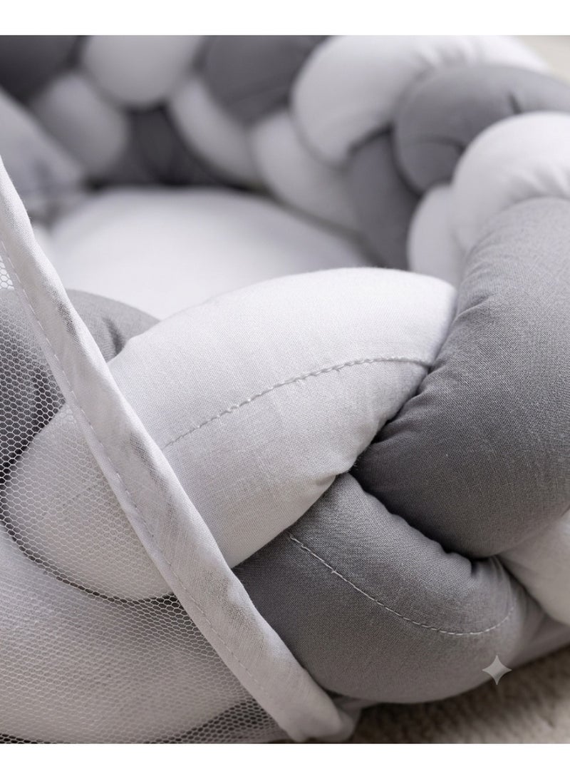 StarKids A portable newborn bed featuring a cozy nest design, a braided protective bumper, and a detachable, built-in mosquito net, ensuring a peaceful, safe, and comfortable sleeping environment for your baby—anytime, anywhere. - Image 3