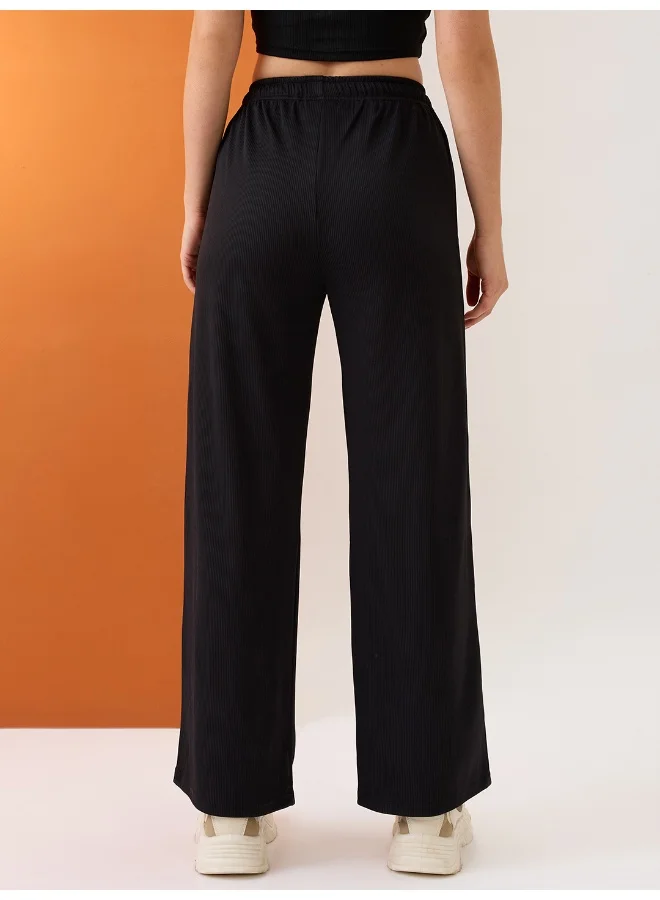 globus Women Black Self Design Mid-Rise Stretchable Straight Fit Trousers