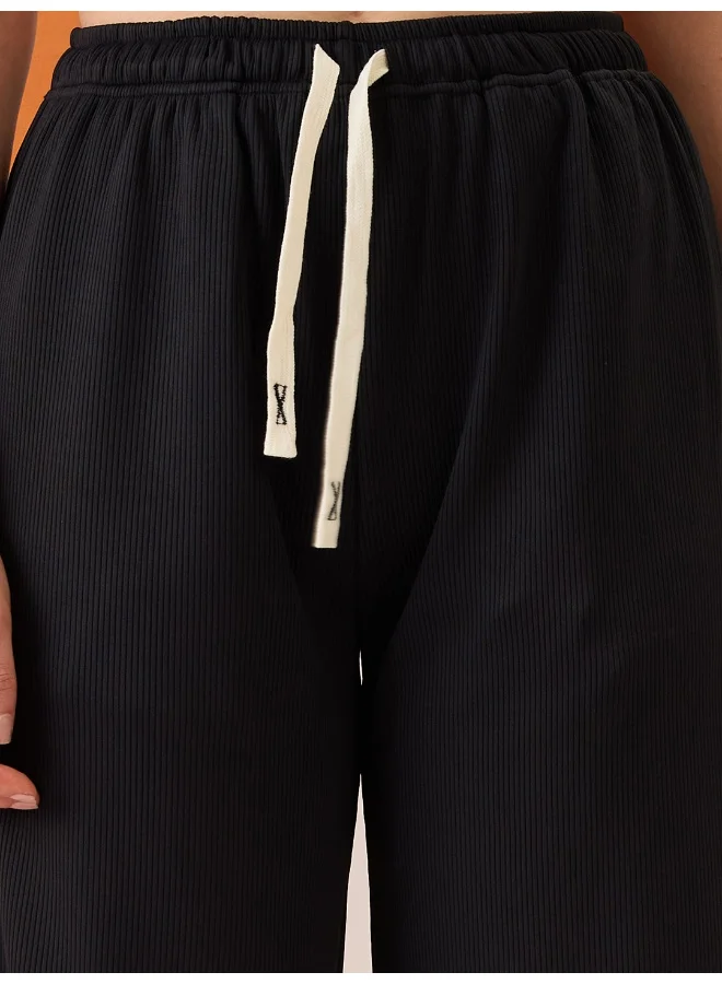 globus Women Black Self Design Mid-Rise Stretchable Straight Fit Trousers