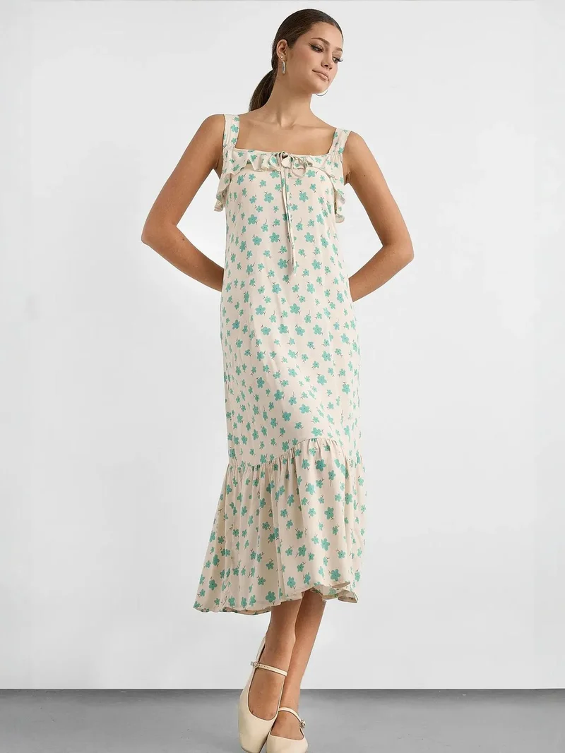 زوبعة فستان ميدي بطبعات وكشكشة