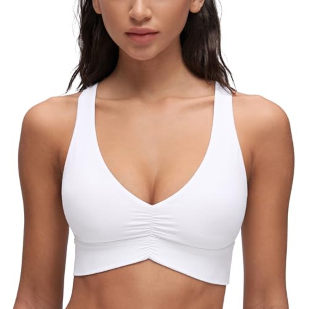 Yoga and workout sports bra with buttery-soft luxe fabric, black color, ruched longline design, V-neck, padded support, wide adjustable straps, and cross-back styling for enhanced comfort and flexibil