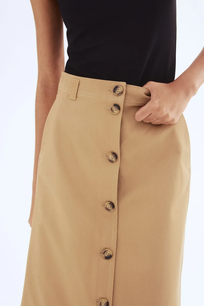 اتش اند ام تنورة قطنية بتصميم