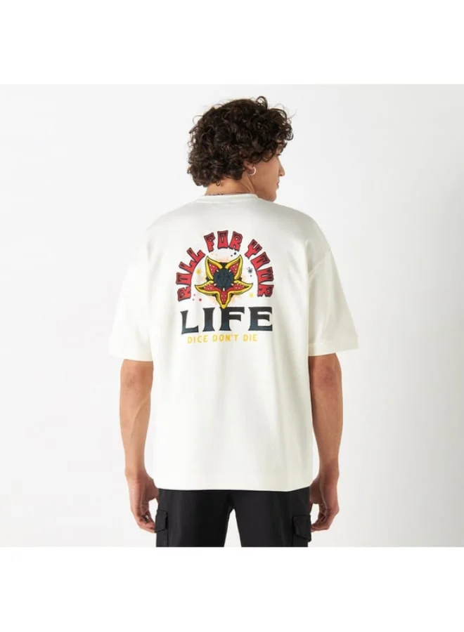 SP Characters Stranger Things Slogan Print T-shirt with Crew Neck and Short Sleeves