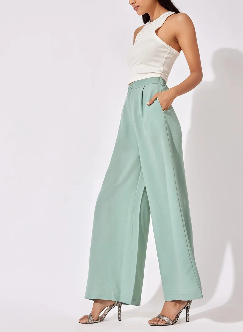 ذا ليبل لايف Sage Green Pleated Flare Pants – Trendy & Comfortable