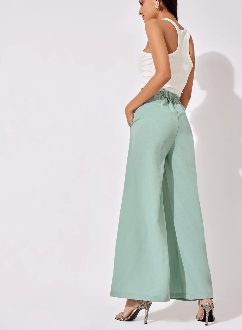 The Label Life Sage Green Pleated Flare Pants – Trendy & Comfortable - Image 3