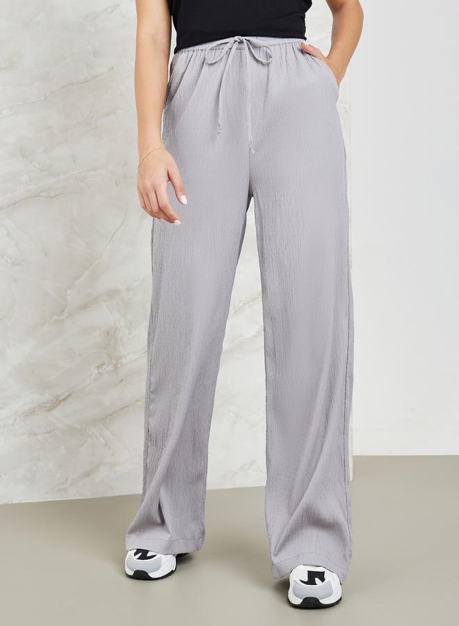Styli Textured Wide Leg Pants with Side Pocket - Image 1