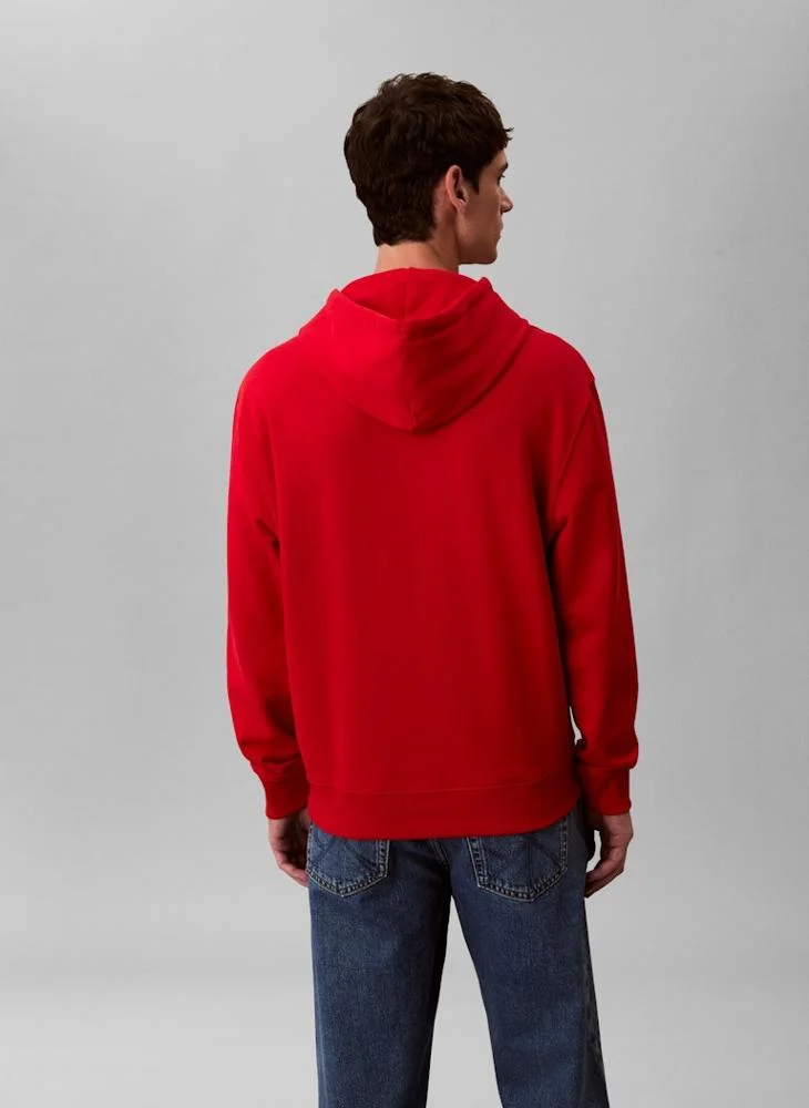 كالفن كلاين جينز سويت شيرت تيري بياقة دائرية بحروف أولى