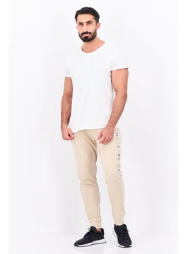 Men Regular Fit Brand Logo Joggers Pants, Beige - pzsku/Z601582234DF8596C5086Z/45/_/1740495420/fe84daad-a0ae-42ef-bc24-7ae3c6b39efd