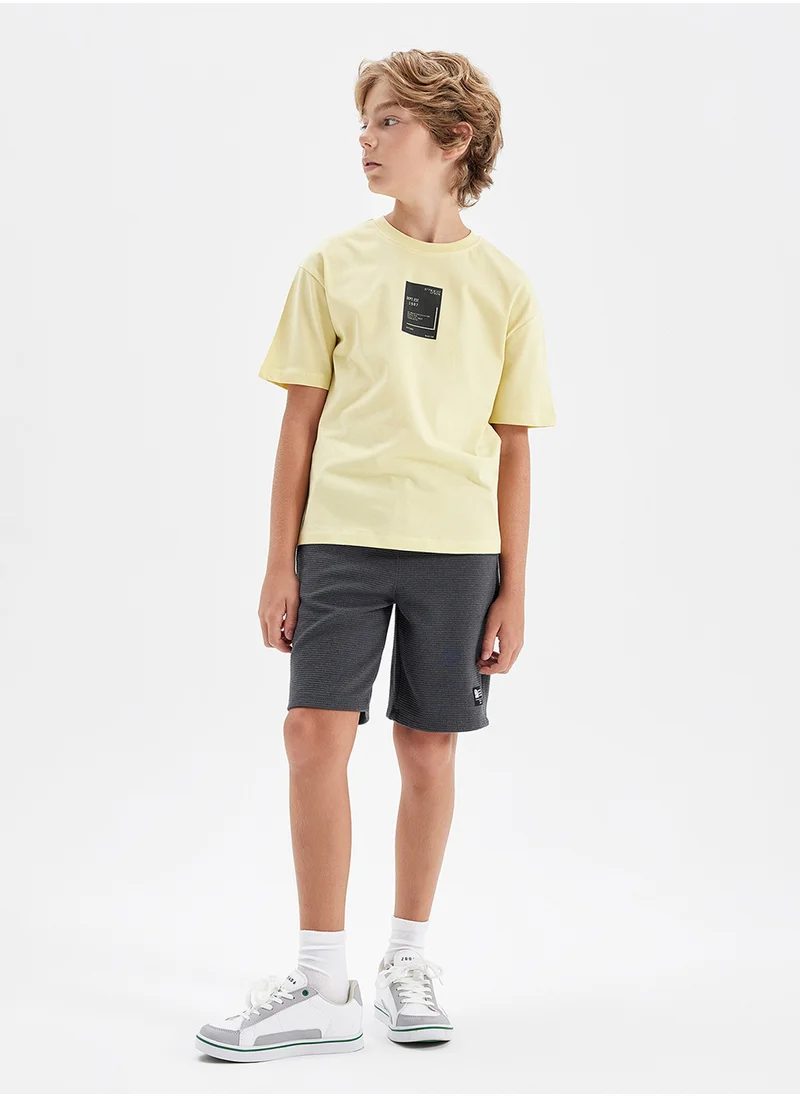 DeFacto Oversized Fit Crew Neck Text Printed Short Sleeve T-Shirt