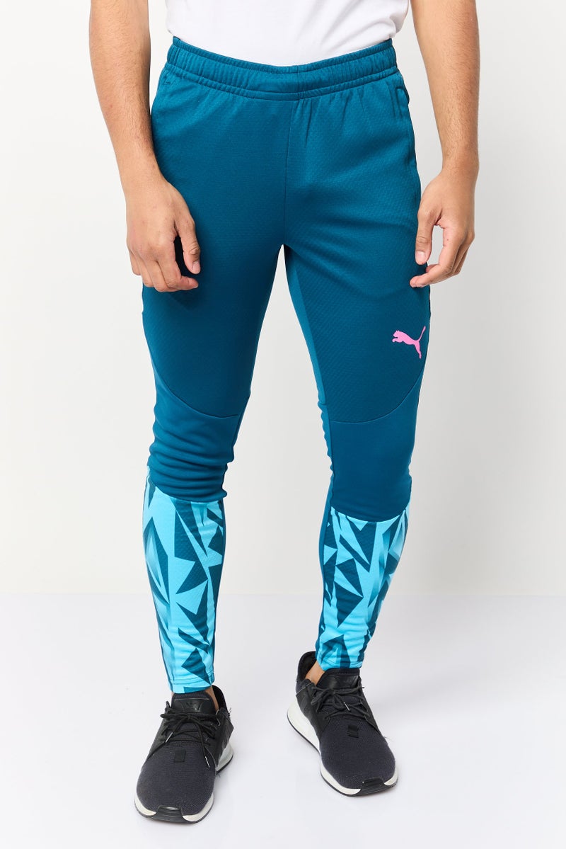 PUMA سروال رياضي ضيق للرجال، أزرق مائل إلى الأخضر - Image 1