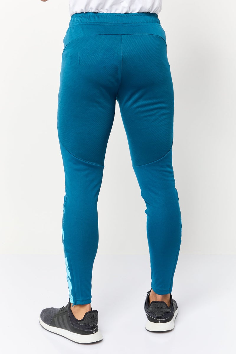 PUMA سروال رياضي ضيق للرجال، أزرق مائل إلى الأخضر - Image 4