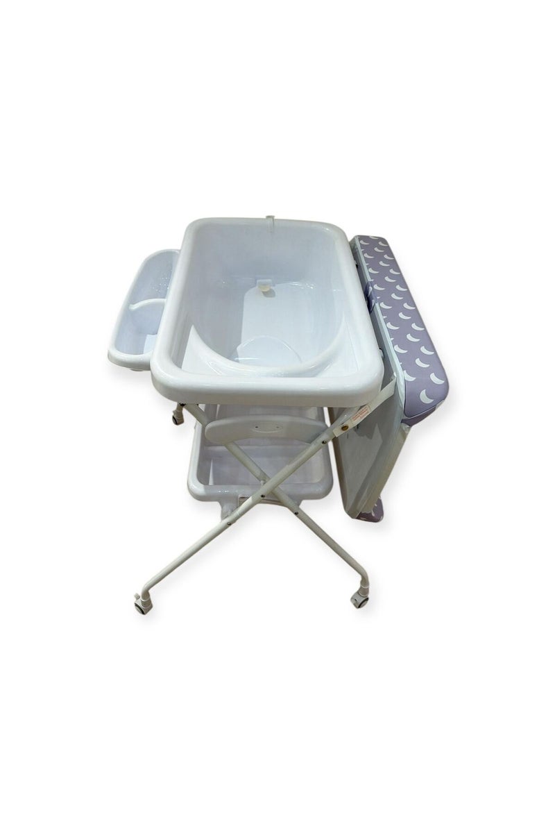 Changing table with removable shower tray and multiple storage drawers - Image 2