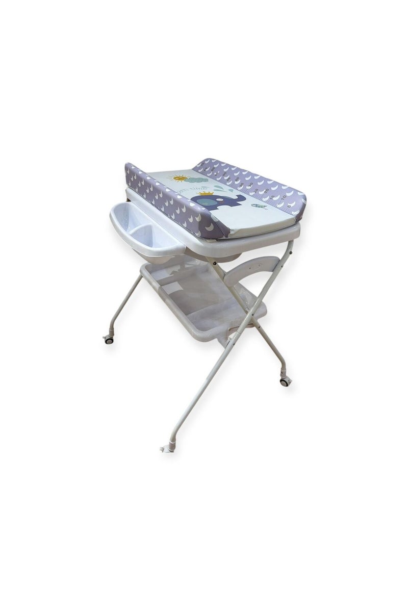 Changing table with removable shower tray and multiple storage drawers - Image 1