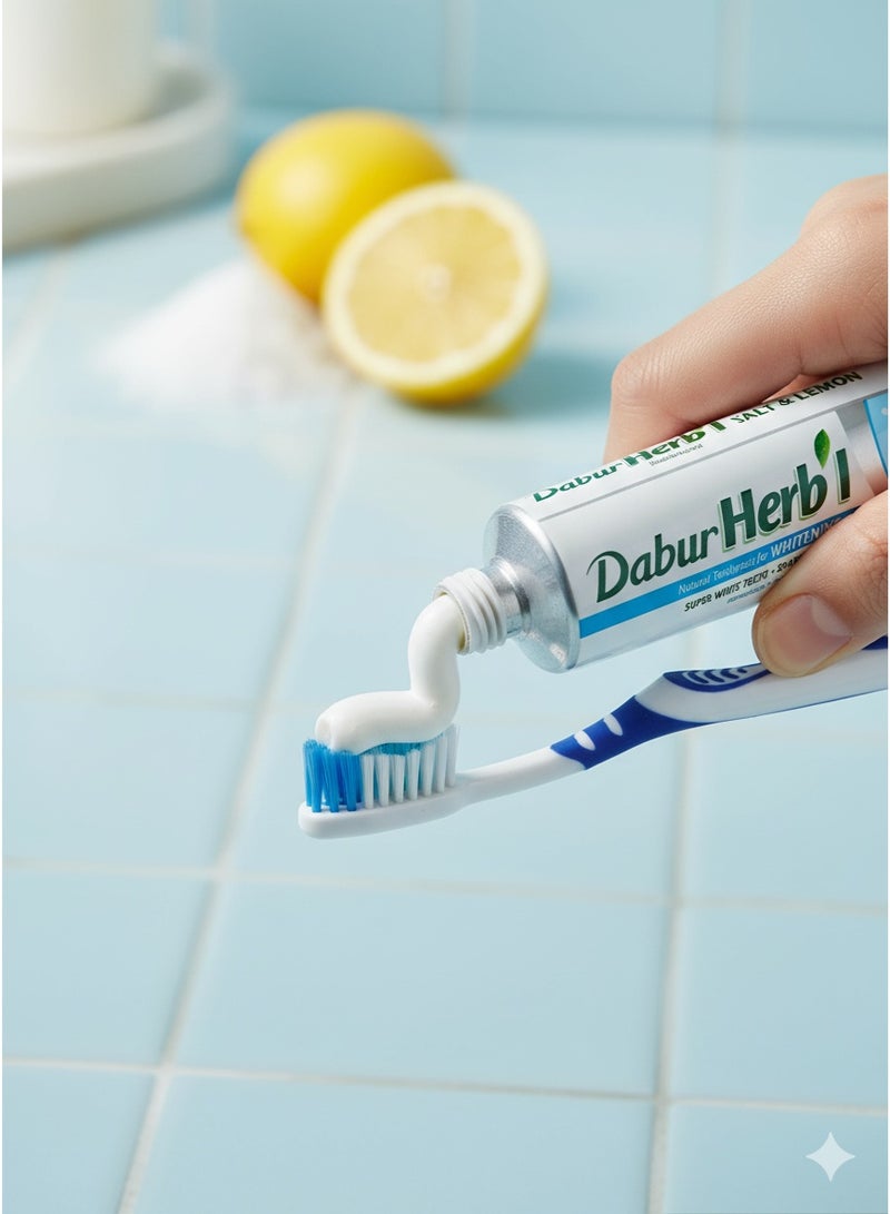 دابر هيربال معجون أسنان بالليمون والملح + فرشاة مجانية – 140 جم – فرشاة بألوان متعددة - Image 2