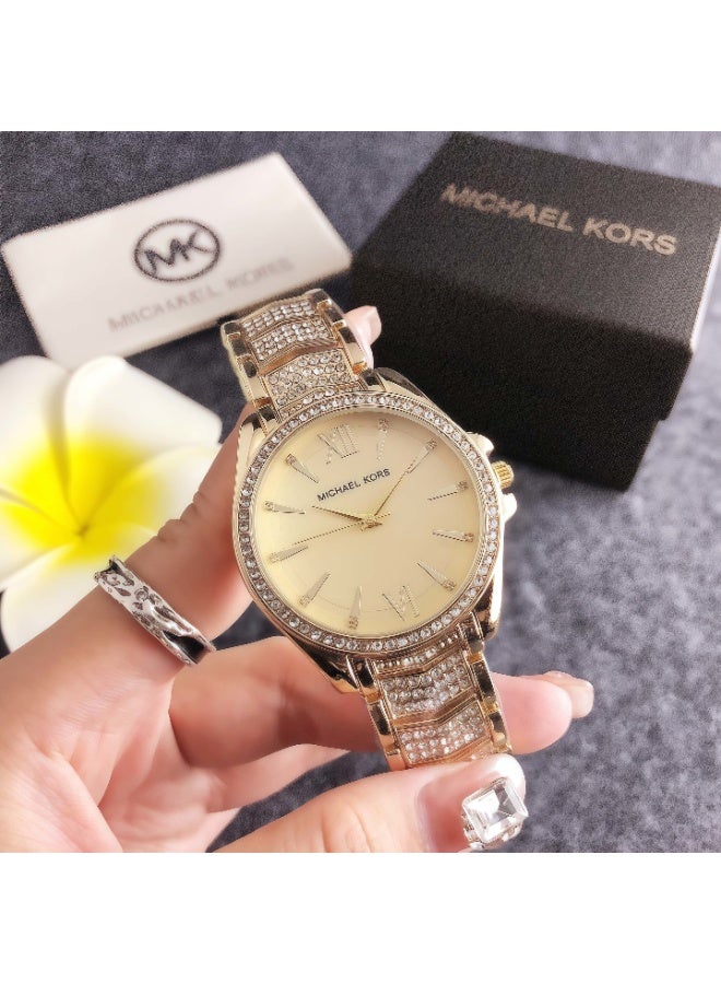 ام كي Michael Kors Women's Watch with Gold - Tone Stainless Steel Bracelet and Crystal - Embellished Champagne Dial