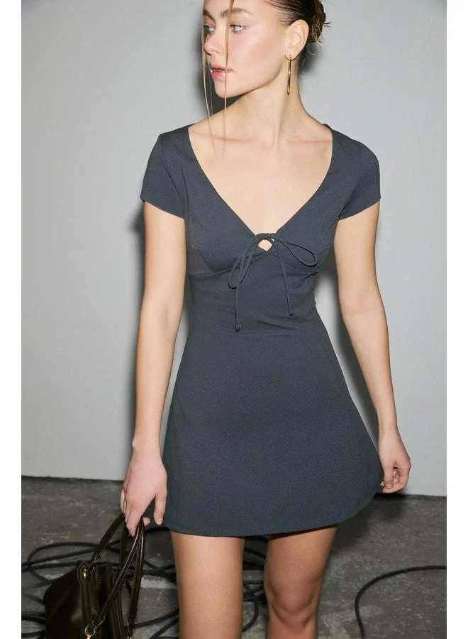 GRIMELANGE LUNELORA Women's Stretch Fabric Chest Tie Detailed Bengalin Mini Grey Dress.