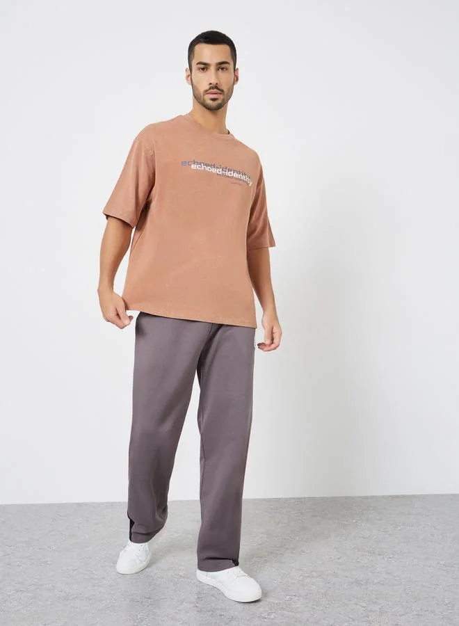 Styli Men Coffee Brown Slogan Print Oversized T-Shirt