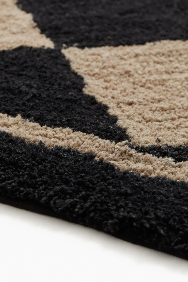 H&M Harlequin-patterned wool-blend rug