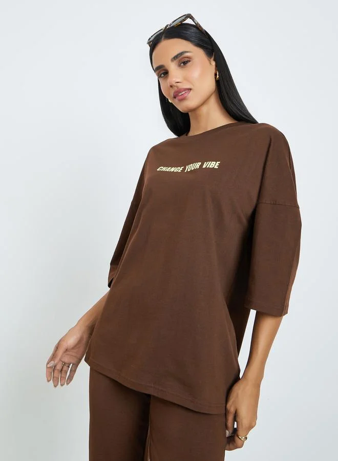 Styli Brown Printed T-Shirt and Flared Leggings Co-Ords