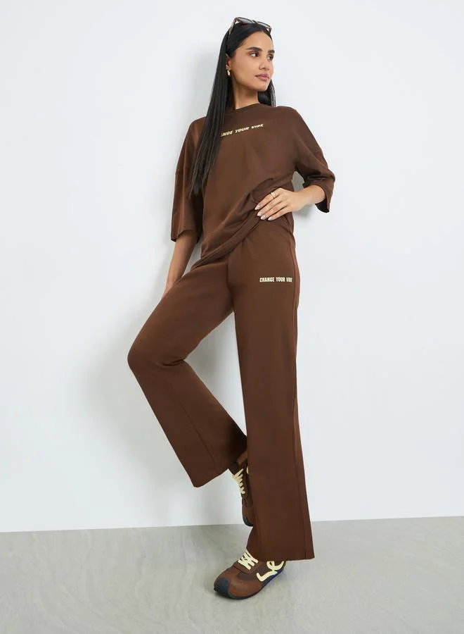 Styli Brown Printed T-Shirt and Flared Leggings Co-Ords