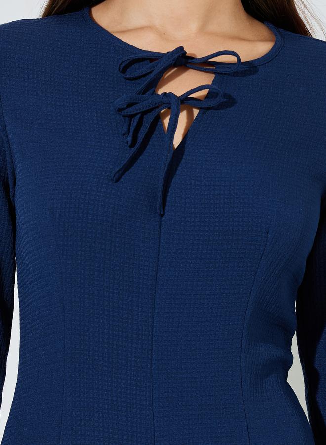 Styli Navy Blue Textured Pleated Details Tie-Up Neck A-Line Maxi Dress - Image 4