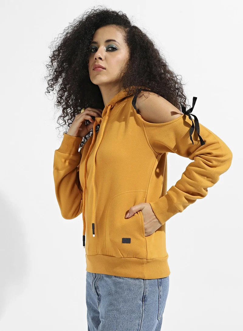 Campus Sutra Women's Yellow Pullover Sweatshirt With Cold Shoulder Sleeve For Casual Wear | Hood Neck | Long Sleeve | Pull On Closure | Cotton Sweatshirt Crafted With Comfort Fit For Everyday Wear