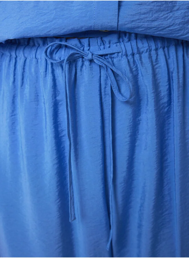 women'secret Long blue pleated satin pajama shirt