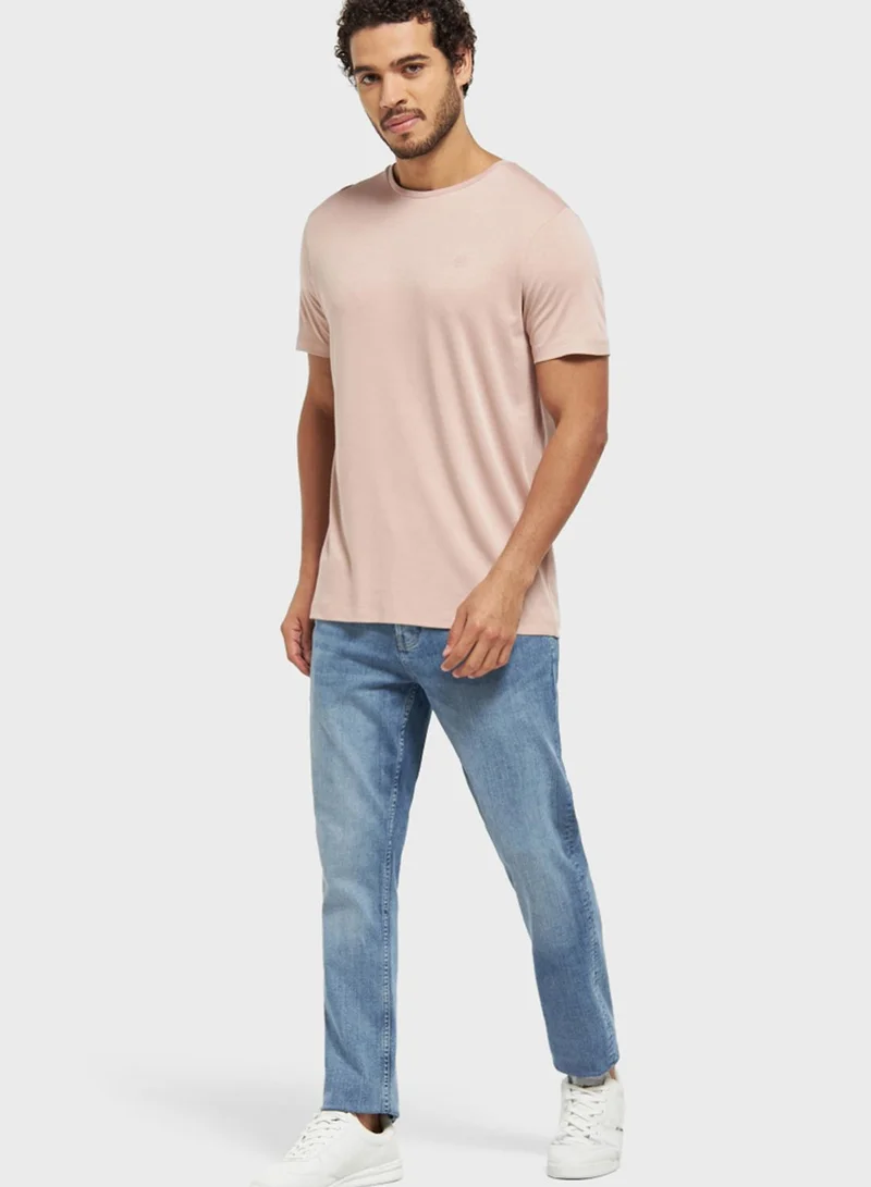 Iconic Mid Wash Slim Fit Jeans
