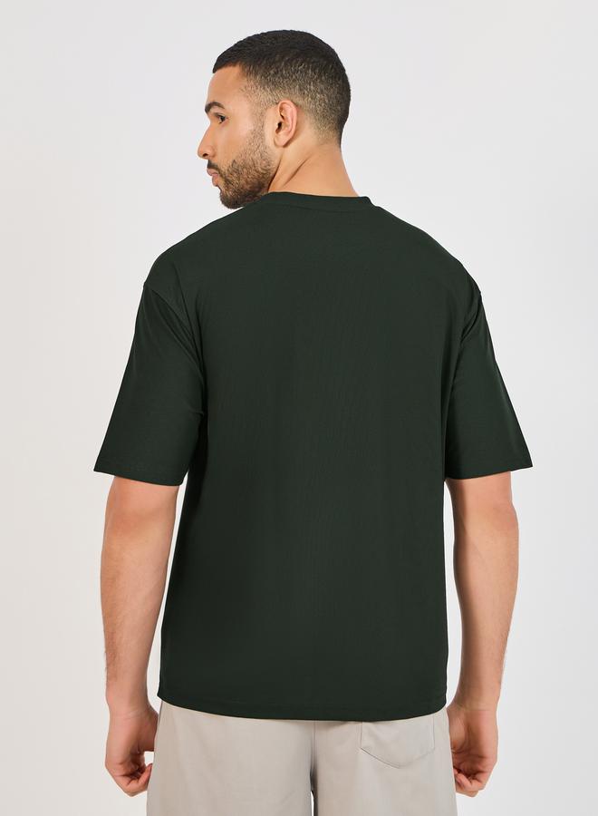 ستايلي اكتيف تيشيرت فضفاض بشعار عاكس للضوء - Image 5