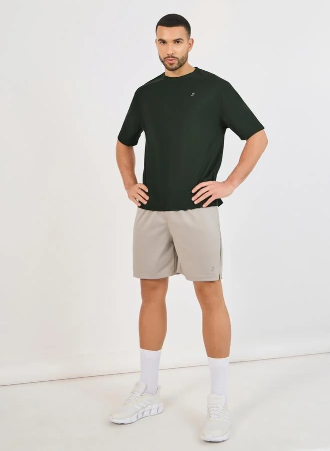 Styli Active Micro Pique Knit Oversized T-Shirt with Reflective Logo