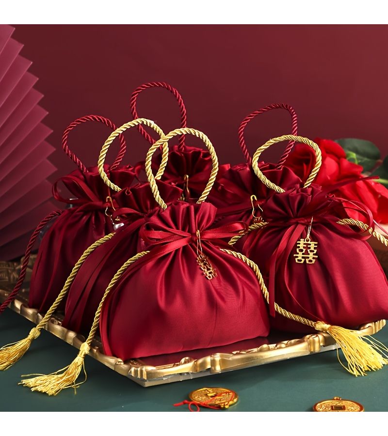 أكياس هدايا أنيقة بخيوط ذهبية وأربطة للسحب لتخزين هدايا حفلات الزفاف - Image 1