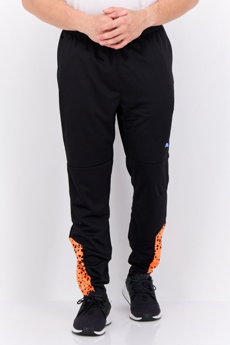 PUMA سروال رياضي خارجي ضيق للرجال، مجموعة سوداء - Image 1