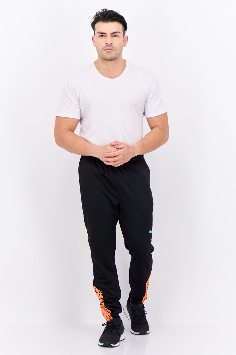 PUMA سروال رياضي خارجي ضيق للرجال، مجموعة سوداء - Image 4